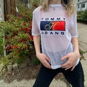 Selling this exclusive UO x Tommy Hilfiger mesh netted top.